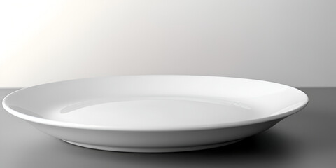 A simple white plate on the table, side view. Empty plate on a light background