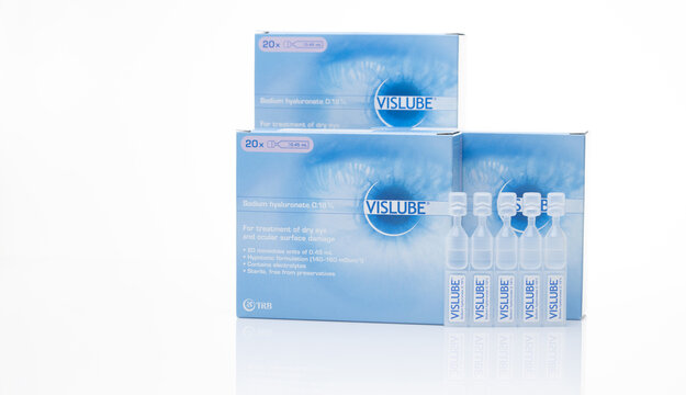 CHONBURI, THAILAND-MAY 3, 2023: Vislube artificial tears. Lubricating eye drops in plastic tube and blue package. Sodium hyaluronate eye drops for treatment dry eye. Artificial tears vial. Eye care.