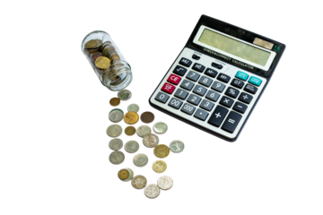 Coins spilling out from a jar with a calculator