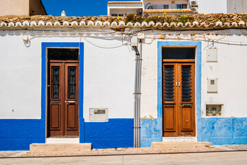 Fototapeta na wymiar Awesome view of portuguese traditional houses, algarve traditional whitewashed places, Albufeira, Algarve, Portugal
