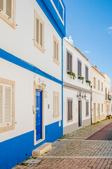 Awesome view of portuguese traditional houses, algarve  traditional whitewashed places, Albufeira, Algarve, Portugal - obrazy, fototapety, plakaty