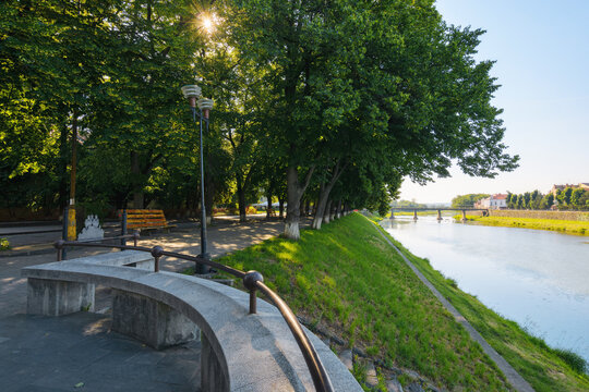 river in the town in morning light. warm sunny weather in uzhhorod