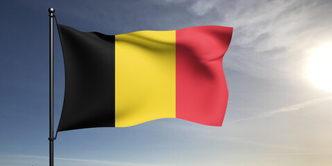 Belgium national flag cloth fabric waving on beautiful grey sky Background.