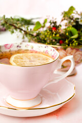 Cup of tea with a lemon slice