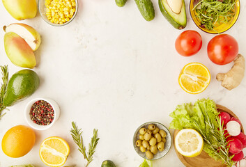 Low carb, FODMAP, Mediterranean, KETO, plant based diet food. Fruits, vegetables, greens, citrus, olives with copy space in the centre. Detox, healthy lifestyle background