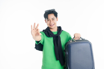 raveler tourist happy man holding luggage okay ok gesture isolated on white background.