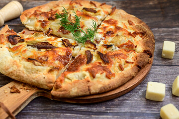 Tasty hot italian focaccia  pizza   with porcini mushroom,and cheese. Pizzeria menu. Concept poster for Restaurants or pizzerias. Top view