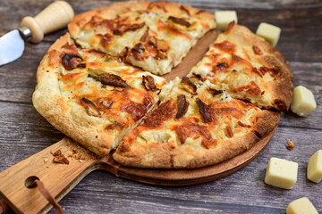 Tasty hot italian focaccia  pizza   with porcini mushroom,and cheese. Pizzeria menu. Concept poster for Restaurants or pizzerias. Top view