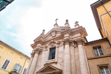 Fototapeta na wymiar Exterior view of the baroque building of San Giorgio, Saint George in Siena, Italy