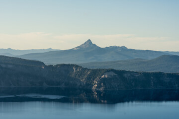 Cliffs Over Crater Lake With Mt. Thielsen In The Distance