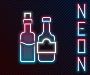 Glowing neon line Whiskey bottle icon isolated on black background. Colorful outline concept. Vector