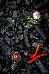 Papier Peint photo Texture du bois de chauffage BBQ grill coal texture with fresh herbs, spices and kitchen utensils, cooking background, place for text, top view