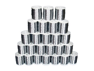 Tin spool on white background.