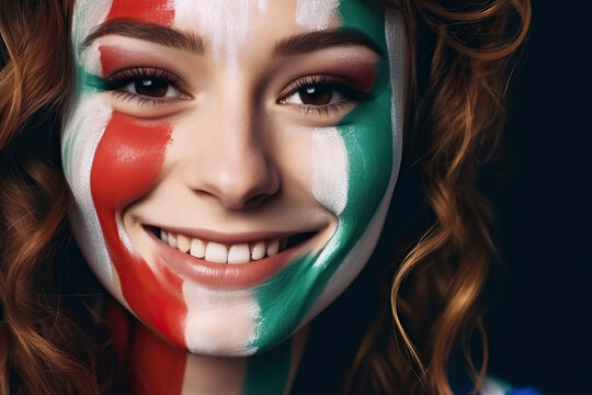 A woman with her face painted in the colors of the flag of italy