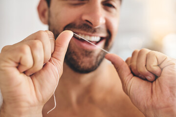 Hands, face and man flossing teeth at home for dental health, plaque and gingivitis on gums....