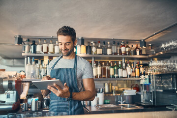 Man in restaurant, tablet and small business with inventory check, entrepreneur in hospitality industry and connectivity. Male owner, scroll and cafe franchise with digital admin and stock taking - obrazy, fototapety, plakaty
