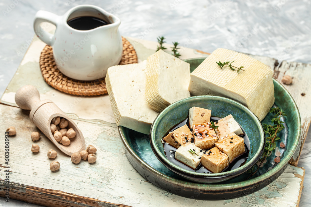 Canvas Prints Teriyaki tofu. vegetarian tofu cubes on a dark background. banner, menu, recipe top view