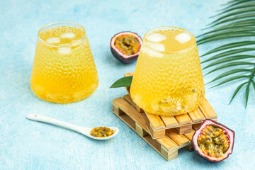 Fresh drink made with passion fruit Caipirinha in a light sunny background, Tropical drink for summer party