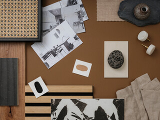 Modern flat lay composition in brown and beige color palette with textile and paint samples, lamella panels and tiles. Architect and interior designer moodboard. Top view. Copy space.