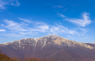 mountain valley under blue sky, wide mountain valley landscape