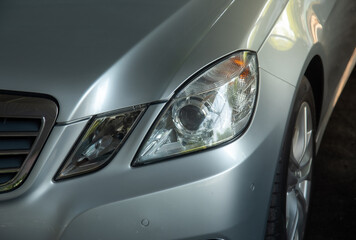 Plakat electric vehicle headlights energy saving technology isolated from the background