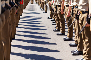 Shadows and boots of australian armed forces at freedom of entry ceremony