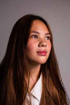 portrait of a teen girl looking to the side