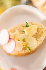Butter board with vegetables and bread