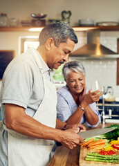 Cooking, old man and happy woman with wine at kitchen counter, healthy food and marriage bonding in home. Drink, glass and vegetables, senior couple with happiness vegetable meal prep and retirement.