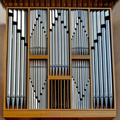 New York, New York, USA: The pipes of the organ at Saint Peters Church in midtown Manhattan form an interesting geometric pattern.