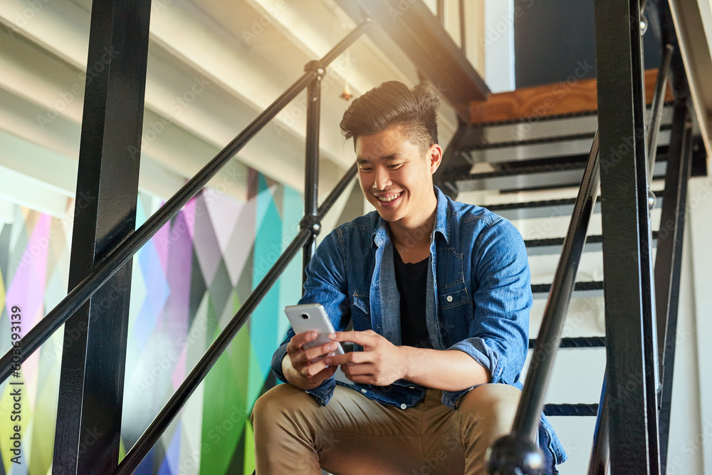 Poster asian man, texting and office stairs with smartphone, smile and communication on social network app.