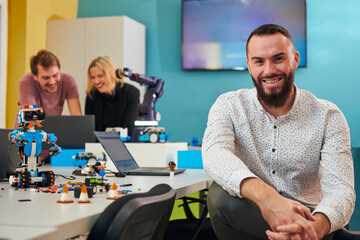 A man working in a robotics laboratory, focusing on the intricate fields of robotics and 3D printing. Showcase their dedication to innovation, as they engage in research, development, engineering, and