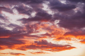 Naklejka na ściany i meble Amazing colorful clouds on the evening sunset.