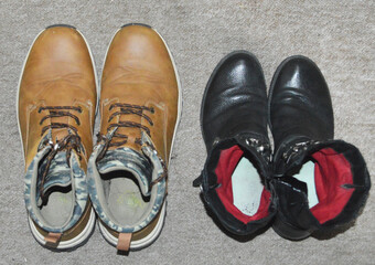 a pair of men's and ladies' shoes