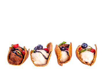 Various sweet taco ice creams. Waffle taco shells with chocolate and vanilla flavour ice cream with different fruits, berry, toppings, isolated on transparent background