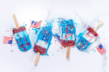 Red, white and blue ice pops.  Patriotic USA lollypops ice cream for july 4 party or bbq picnic,...