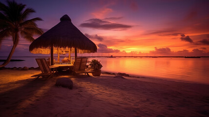 Tropical desert island with a hut on the beach at sunset