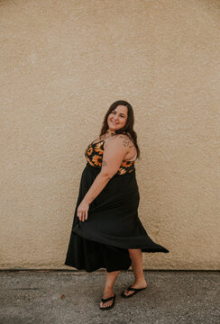 plus size woman dances
