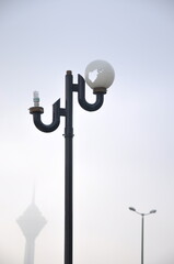 street lamp on blue sky background