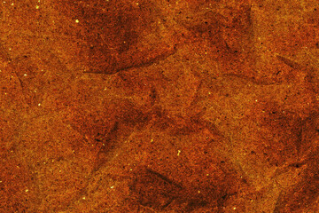 Rusty and scratched brown metal background.