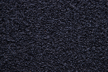 Fototapeta premium Black colors Onion seeds harvest Closeup focus pattern texture background