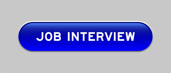 Blue color capsule shape button with word job interview on gray background