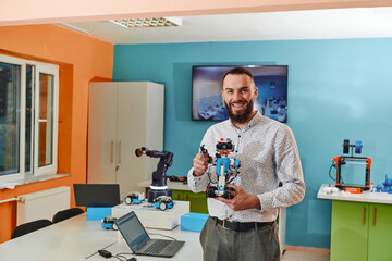A man working in a robotics laboratory, focusing on the intricate fields of robotics and 3D printing. Showcase their dedication to innovation, as they engage in research, development, engineering, and