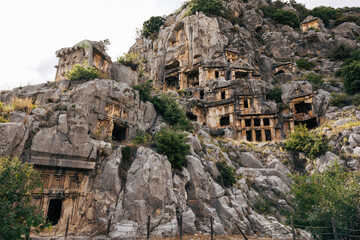 Fototapeta na wymiar Demre's Cliffside Legacy: King's Tombs in Myra Ancient City, Antalya