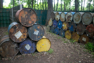 Polygon for playing paintball with barrels in the forest area