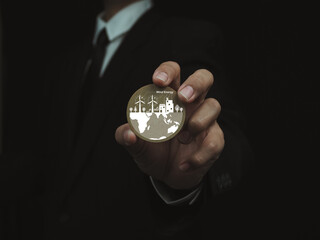 businessman holding Global renewable energy hologram Natural ideas that reduce global warming Using renewable energy that is environmentally friendly