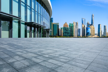 Fototapeta na wymiar Empty square floor and city skyline with modern buildings in Shanghai, China.