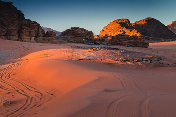 Fototapeta na wymiar Amazing and spectacular landscapes of Wadi Rum desert in Jordan. Dunes, rocks are all Beautiful weather gives the climate to this place.
