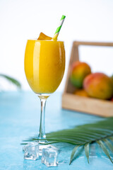 Mango juice with ice cubes, fresh and tasty mango juice image