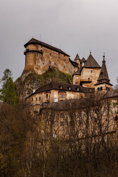 Dark castle on the top of the cliff.
